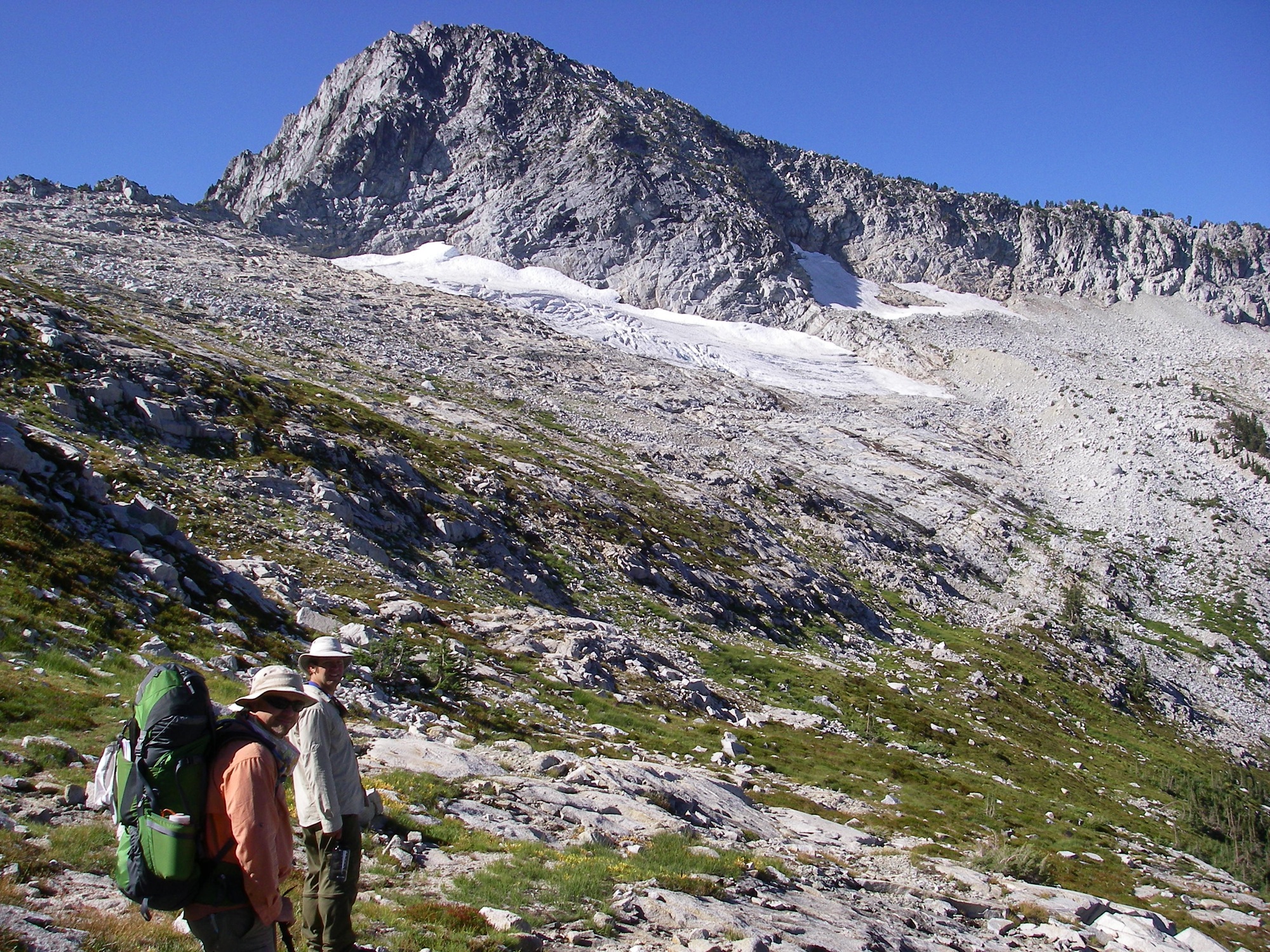 Thompson Peak and Grizzly Glacier in September 2014. Conspicuous glacial foreland and surrounding moraine show the entire flora study area. (Photo by Tony LaBanca)