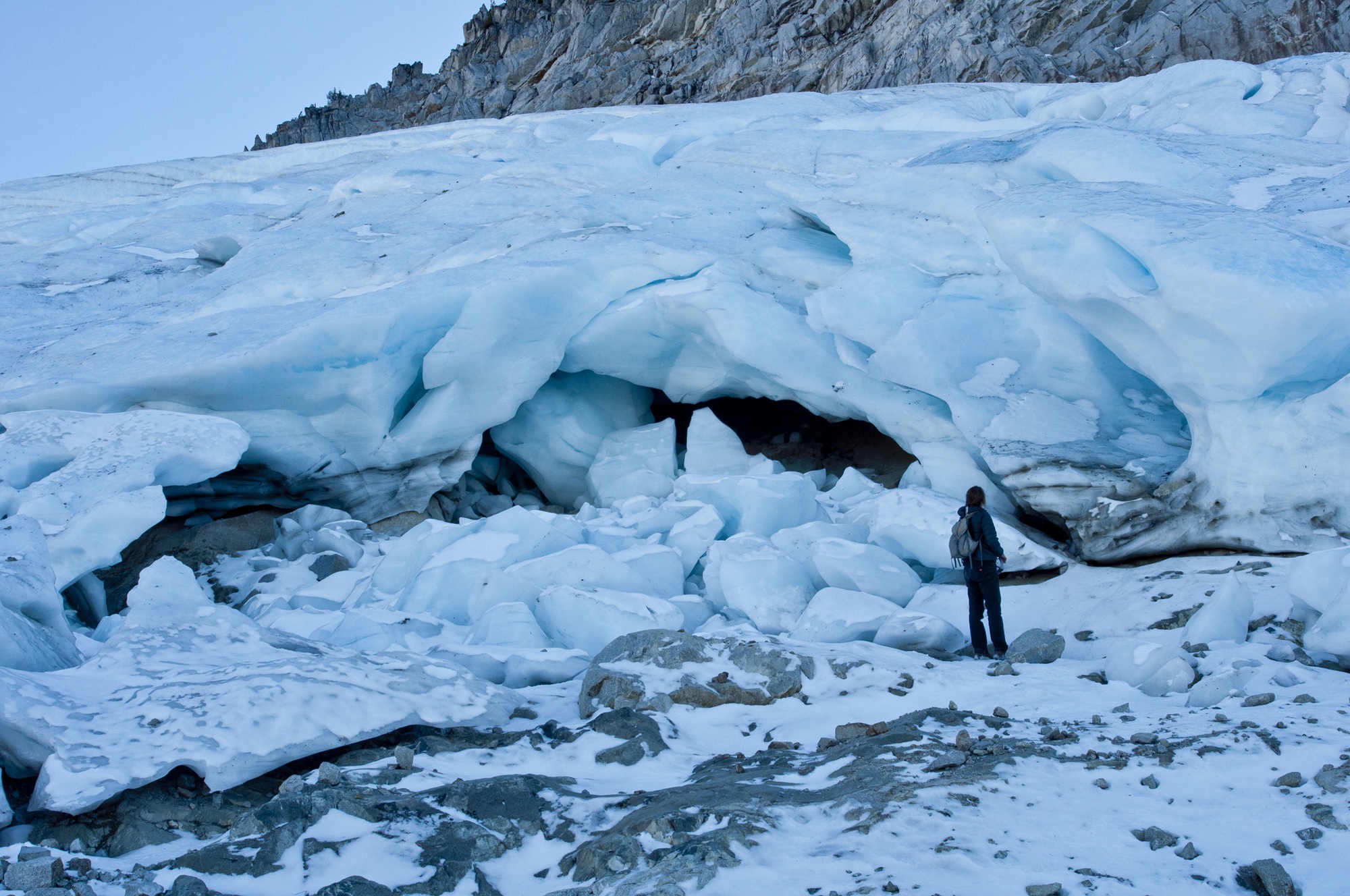 Grizzly Glacier up close during fall of 2014 after two summers of drought and retreat causing ice boulders to cleave off the lower terminus. This last glacier in the Klamath mountains vanished by the end of 2022 after a decade of relentless droughts coupled with multiple low-precipitation winters. (Photo by Ken Lindke)